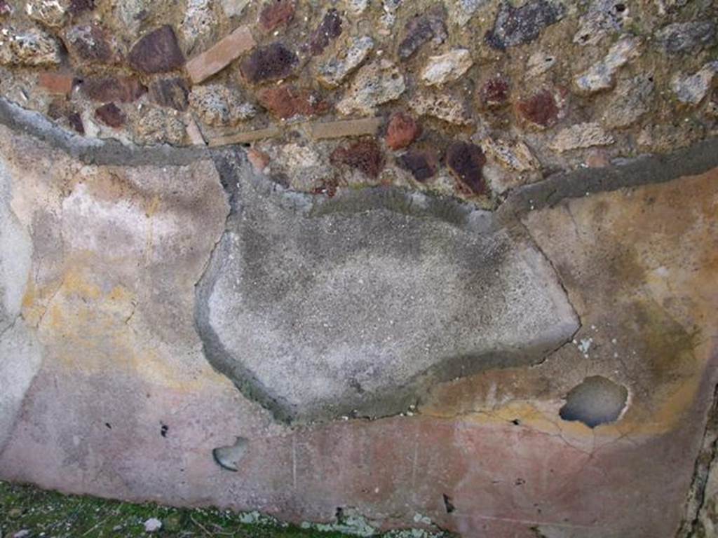 IX.9.a Pompeii. March 2009. South wall of cubiculum. This bedroom was described as having flooring of crushed brick (mattone pesto) with pieces of coloured marble of various forms and sizes added to it. The walls were plastered, with a yellow background in the middle part, with a white frieze and red plinth or dado. In the middle of the yellow panels were rather crudely painted doves. See Notizie degli Scavi, 1888, p.515.