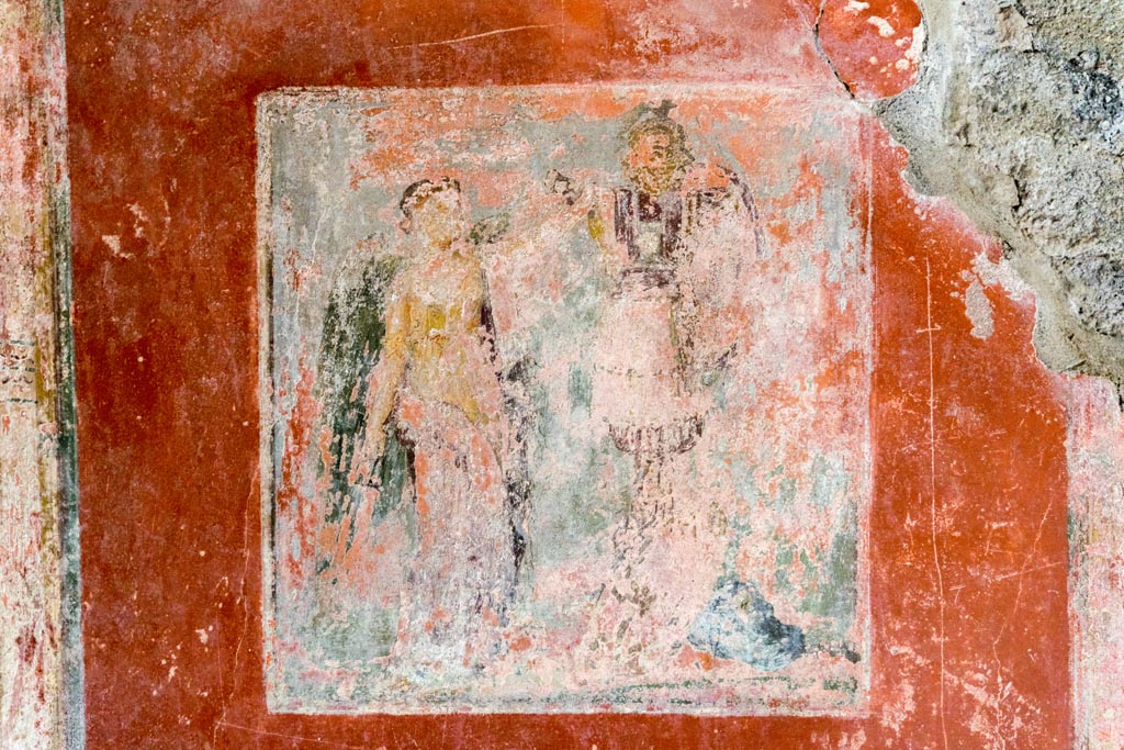 IX.9.c Pompeii. March 2023. 
Central wall painting of Nike and a trophaeon from east wall of cubiculum. Photo courtesy of Johannes Eber.