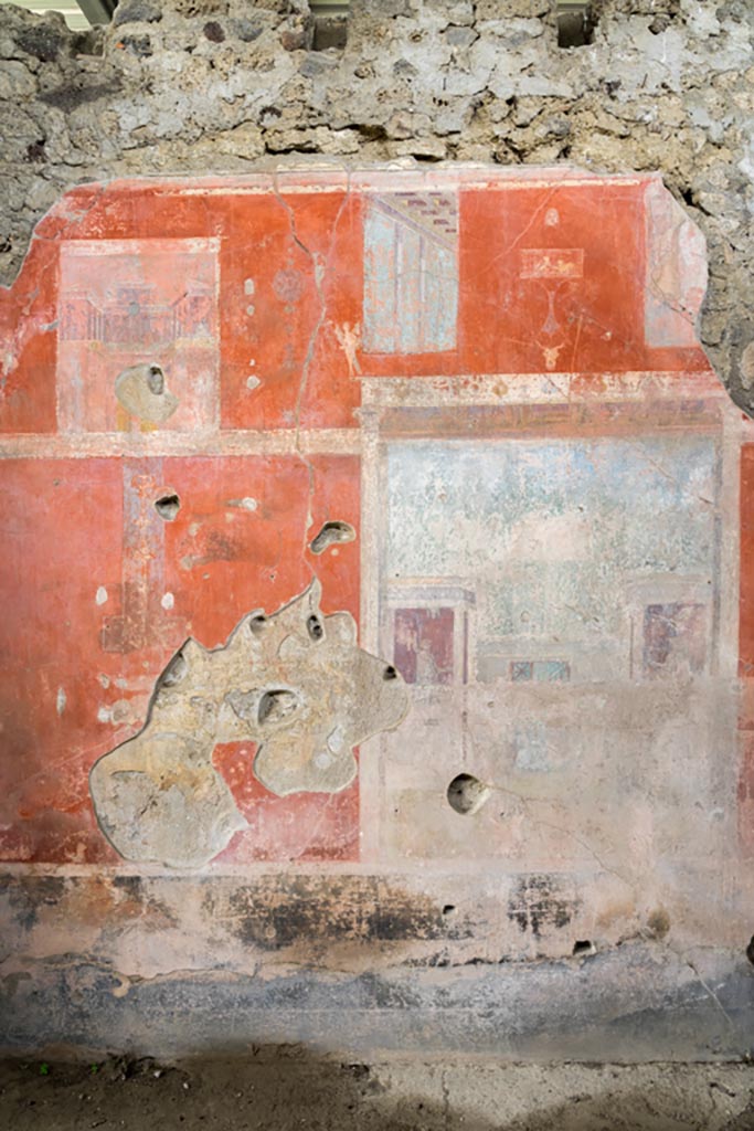IX.9.c Pompeii. March 2023. 
Looking towards east end of south wall in triclinium. Photo courtesy of Johannes Eber.