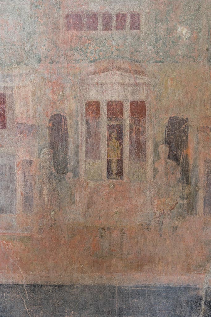 IX.9.c Pompeii. March 2023. 
Detail of divinity and figures from centre of wall painting in middle of west wall. 
Photo courtesy of Johannes Eber.