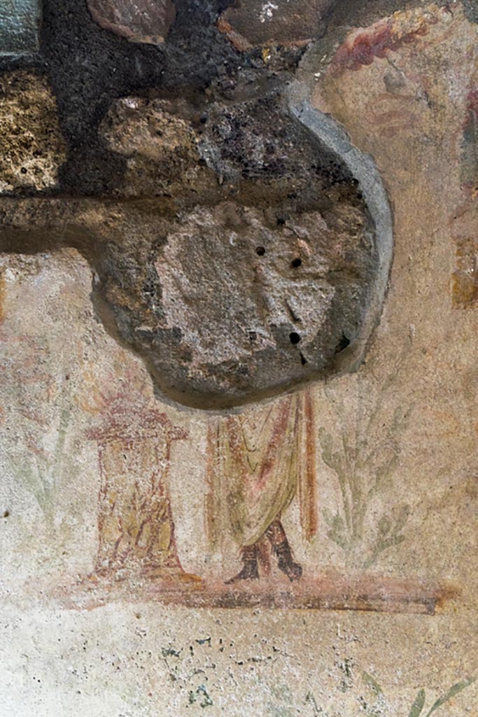 IX.9.c Pompeii. March 2023. 
West wall of kitchen with remaining painting of Genius. Photo courtesy of Johannes Eber.