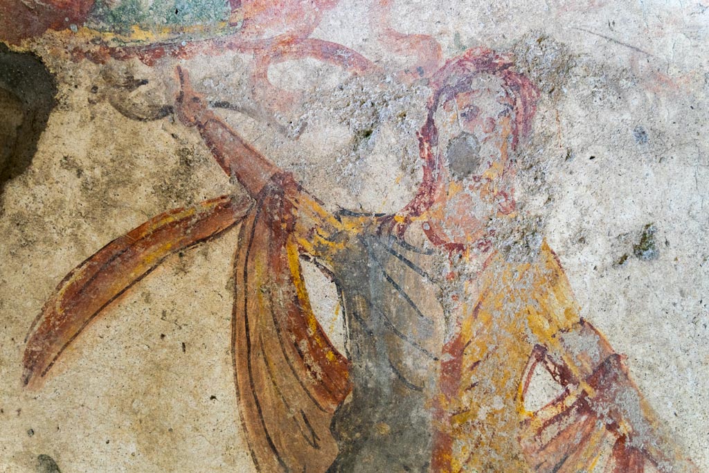 IX.9.c Pompeii. March 2023. 
Detail of painted Lar from west side of painted altar on north wall of kitchen. Photo courtesy of Johannes Eber.