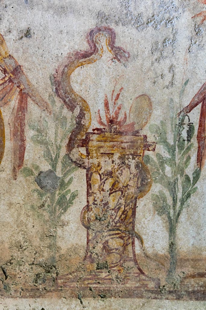 IX.9.c Pompeii. March 2023. 
Detail of round altar with serpent. Photo courtesy of Johannes Eber.