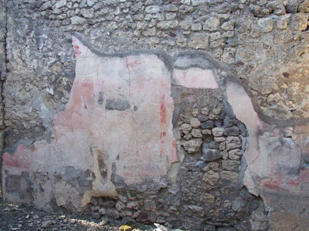 IX.9.d Pompeii. March 2009. Room l, north wall of triclinium/oecus. According to NdS, in the central panel of the north wall was a painting of a woman sitting on a chair wearing a barbaric costume. In front of her were two young heroes. The average height of the figures was 0.46m. The poor conservation of the painting made it impossible to distinguish more, but the subject was thought to be similar to three others found at Pompeii. 
See Helbig, W., 1868. Wandgemälde der vom Vesuv verschütteten Städte Campaniens. Leipzig: Breitkopf und Härtel. (Nos: 1387 and 1387b)
See Sogliano, A., 1879. Le pitture murali campane scoverte negli anni 1867-79. Napoli: Giannini. (no.626, on page 128)
See Notizie degli Scavi, 1889, p.131.