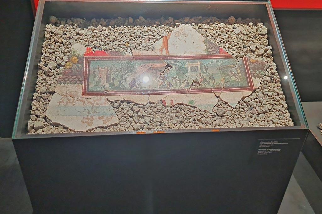 IX.10.1 Pompeii. March 2024. 
Fragment of ceiling with painting of a Nilotic scene, on display in an exhibition in the Palaestra entitled –
“L’altra Pompei, vite comuni all’ombra del Vesuvio”. Photo courtesy of Giuseppe Ciaramella.