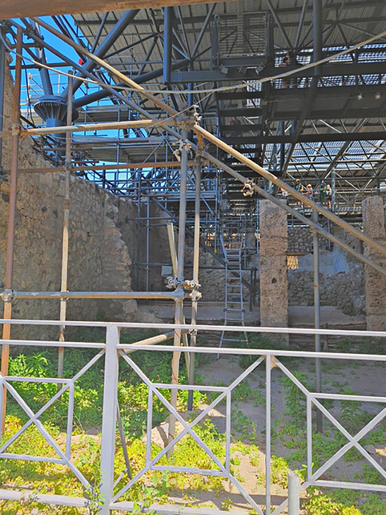 IX.12.1 Pompeii. June 2024. 
Looking north through entrance doorway into room “a”, with rear rooms “b”, on left, and “c”, on right. 
Photo courtesy of Giuseppe Ciaramella.