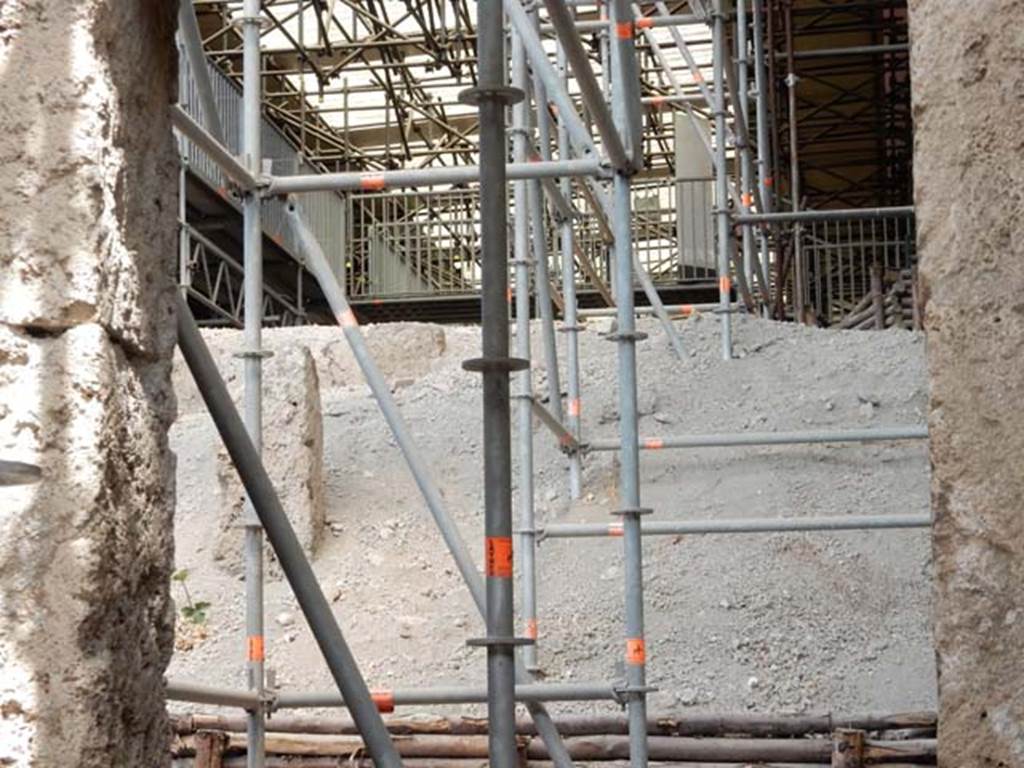 IX.12.1 Pompeii, May 2018. 
Looking north through doorway to rear room “c”, towards pumice from entrance doorway. Photo courtesy of Buzz Ferebee.