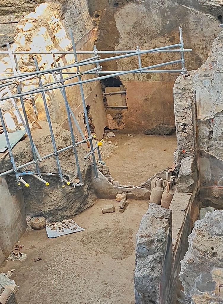 IX.12.4 Pompeii. June 2024. 
Looking north from above IX.12.4 across room “q”. In the upper centre is room “p”.
Photo courtesy of Giuseppe Ciaramella.
