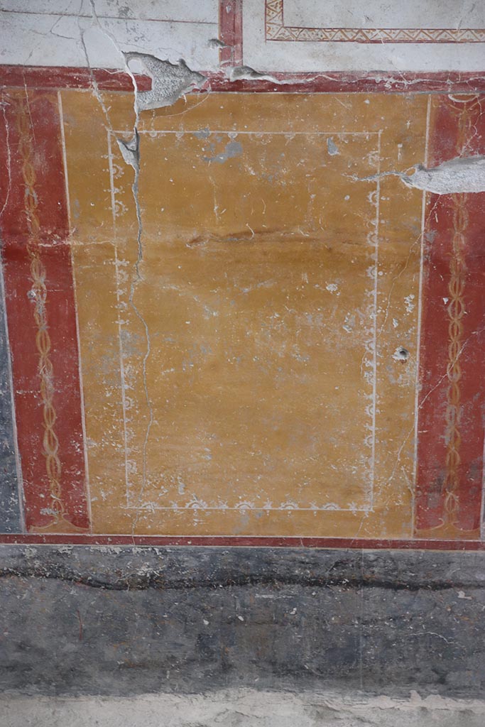 IX.12.4 Pompeii. October 2024. 
Room “o”, detail of painted panel on south wall. Photo courtesy of Klaus Heese.