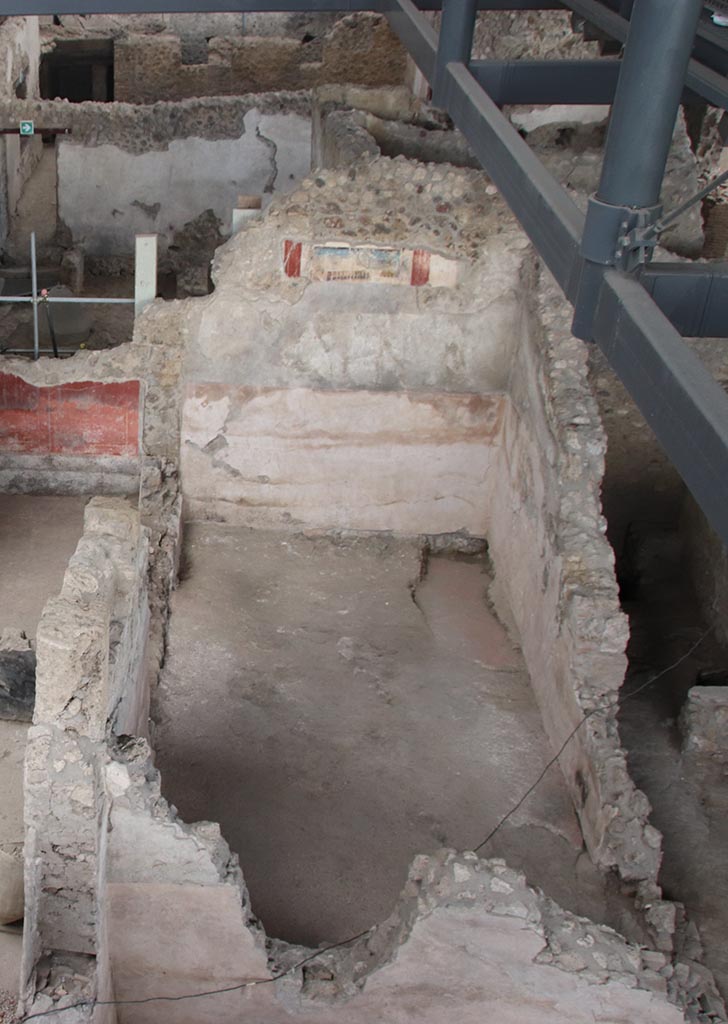 IX.12.4 Pompeii. October 2024. Looking east towards room “f” from above room “e”. 
Photo courtesy of Klaus Heese.