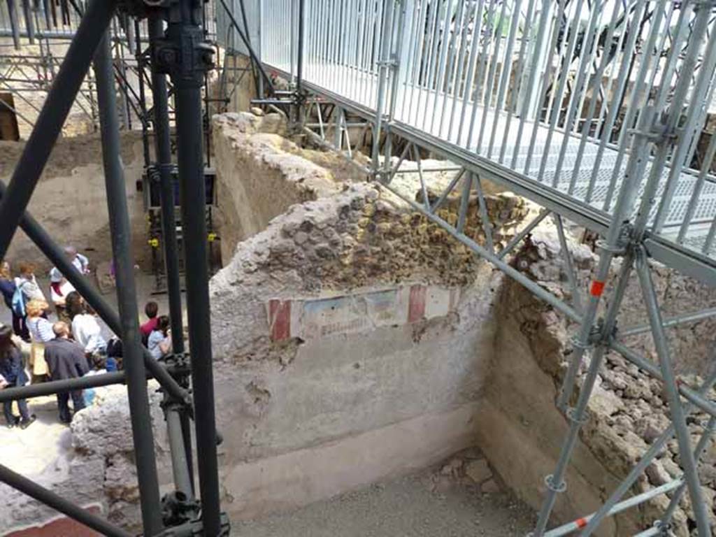 IX.12.4 Pompeii. May 2010. Room “f”, south-east corner of room being excavated, on west side of bakery at IX.12.6.