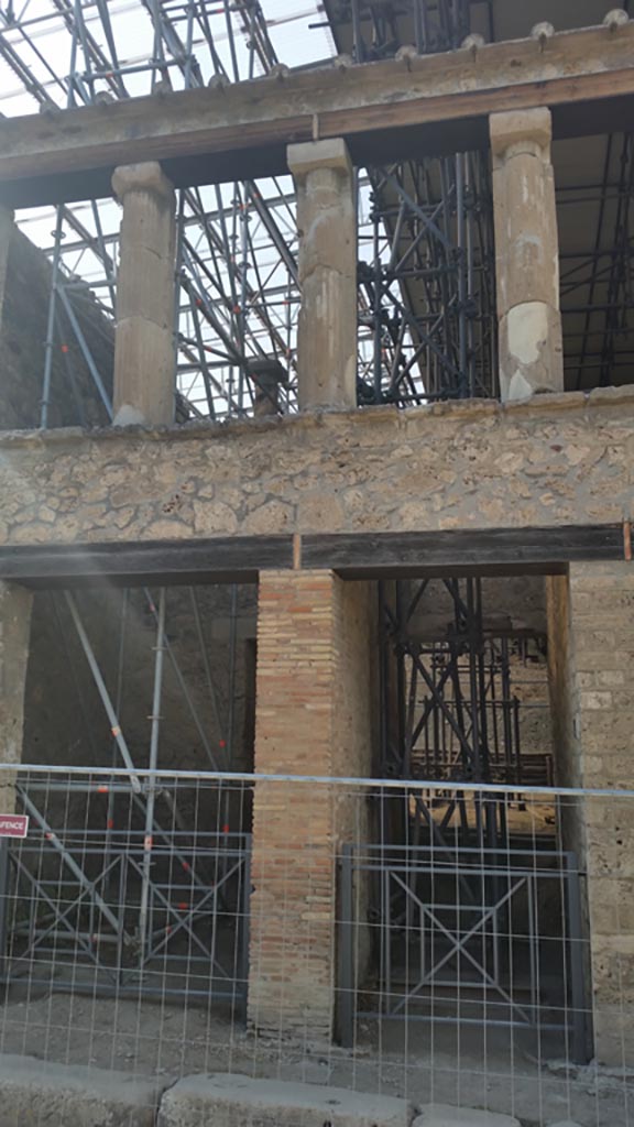 IX.12.4 Pompeii, on right. August 2023. 
Front façade, with entrance at IX.12.3, on left. Photo courtesy of Maribel Velasco.
