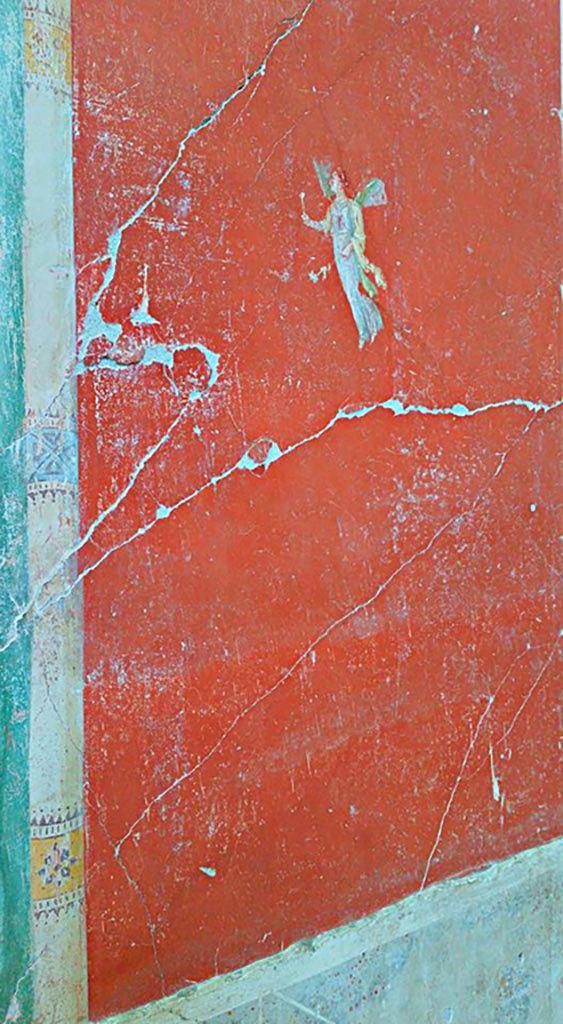 IX.12.6 Pompeii. 2016/2017.
Room “m”, flying figure from north side of central painting on west wall.
Photo courtesy of Giuseppe Ciaramella.
.