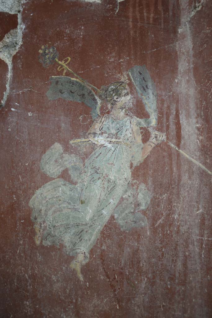 IX.12.6 Pompeii. February 2017. 
Room “m”, detail of flying figure at north end of east wall in north-east corner.
Photo courtesy of Johannes Eber.