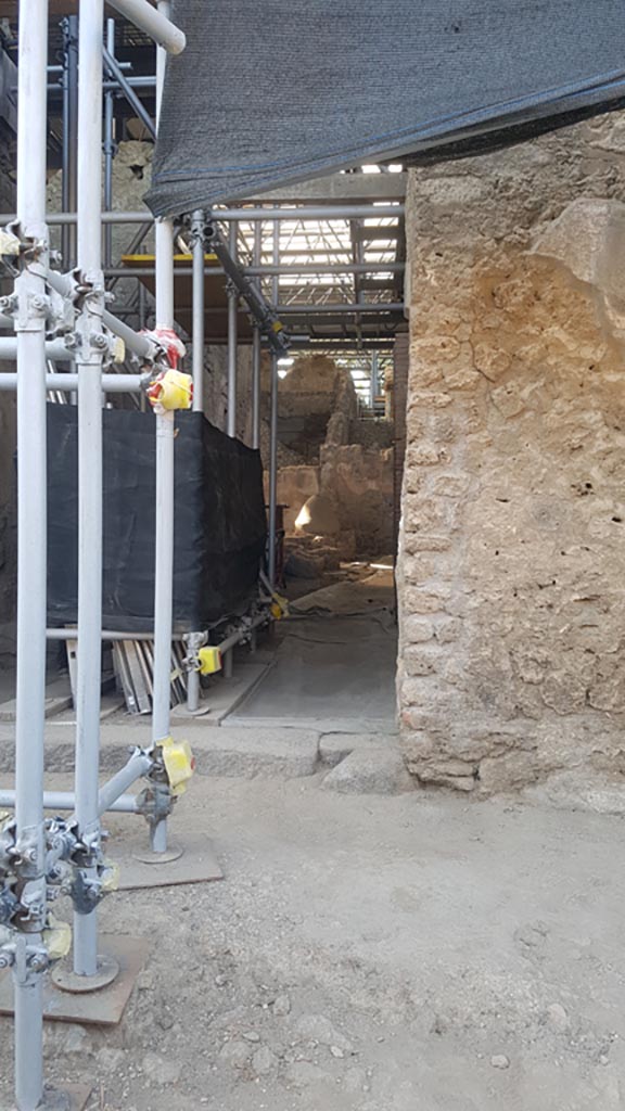 IX.12.6 Pompeii. August 2023. 
Looking north through entrance doorway. Photo courtesy of Maribel Velasco.
