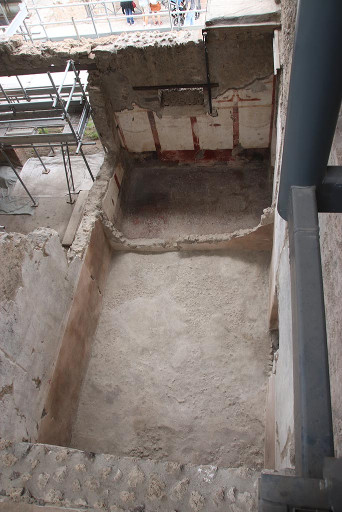 IX.12.6 Pompeii. October 2024. 
Looking south to room “c”, upper centre, from above room “c2”. Photo courtesy of Klaus Heese.