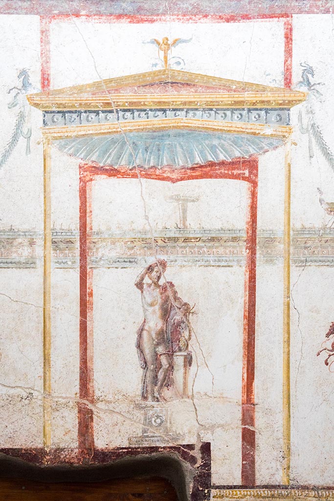 IX.12.A/IX.12.9 Pompeii. July 2024.
Room 18, Apollo in centre of upper east wall. Photo courtesy of Johannes Eber.