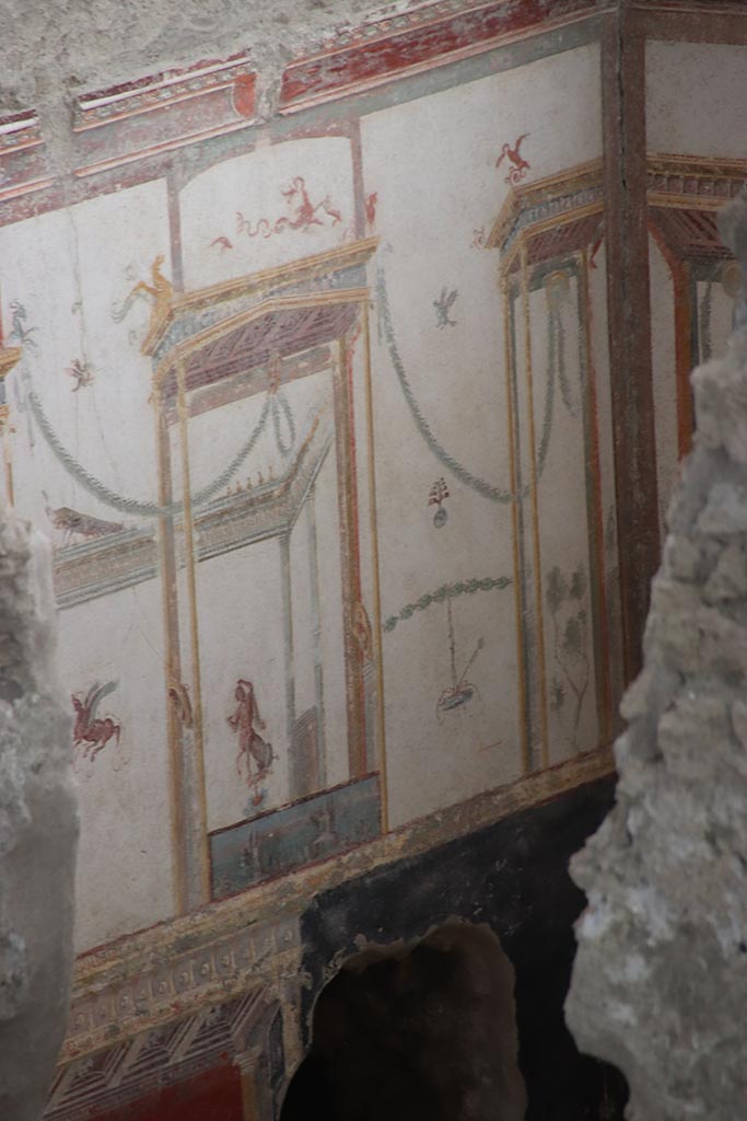 IX.12.A/IX.12.9 Pompeii. October 2024. 
Room 18, upper east wall and south-east corner. Photo courtesy of Klaus Heese.