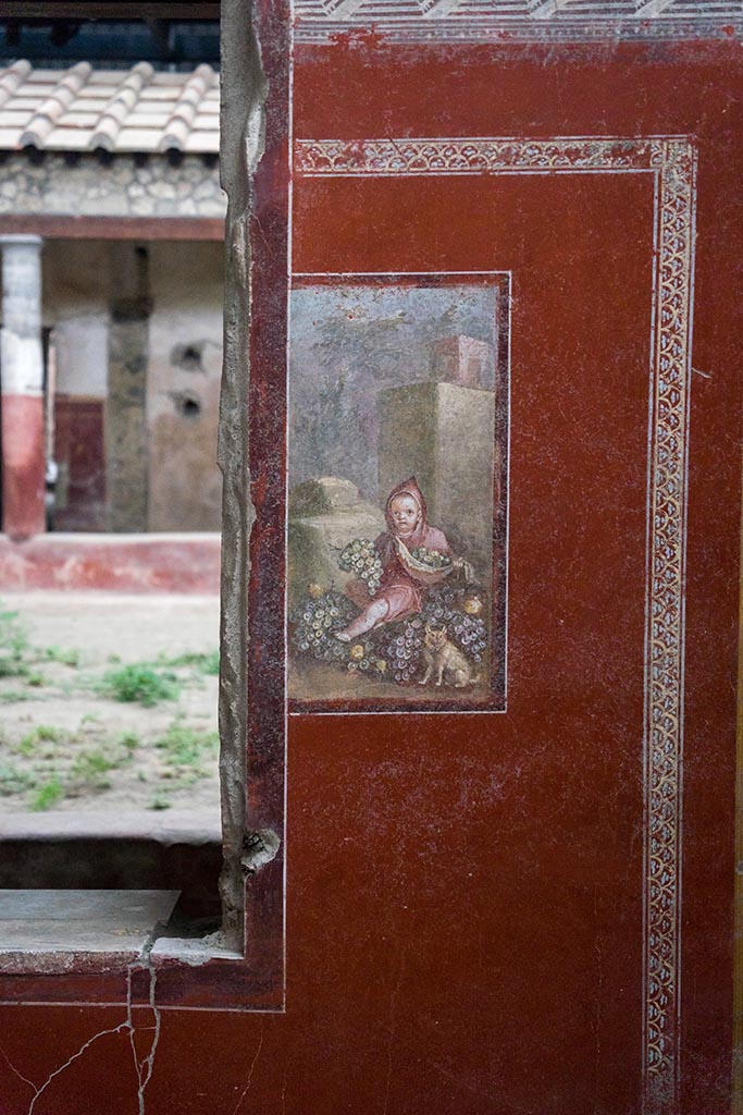 IX.12.A/IX.12.9 Pompeii. July 2024. 
Room 18, painting in centre of east wall. Photo courtesy of Johannes Eber.