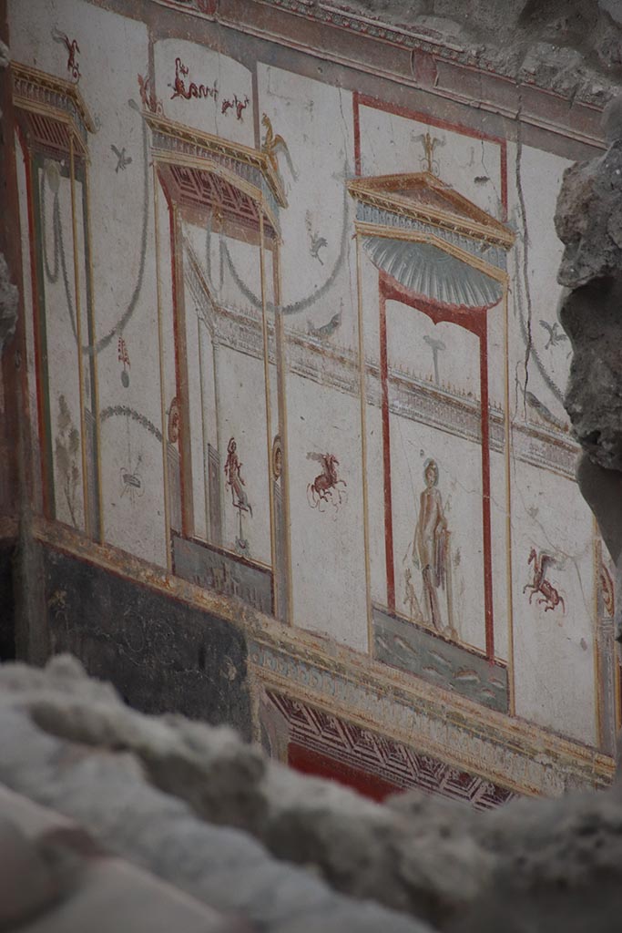 IX.12.A/IX.12.9 Pompeii. October 2024. 
Room 18, upper west wall at south end, with central painting of Dionysus. Photo courtesy of Klaus Heese.
