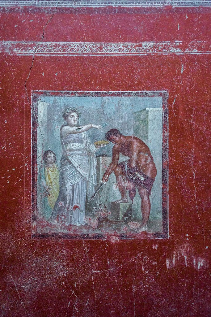 IX.12.A/IX.12.9 Pompeii. July 2024. 
Room 18, central painting of the Purification of Orestes from west wall. Photo courtesy of Johannes Eber.
See E-Journal 14, 24.05.24 Regio IX, 12: Insula dei Casti Amanti, Casa dei Pittori al lavoro, Ambiente 18: nota preliminare, p. 16, fig. 32.