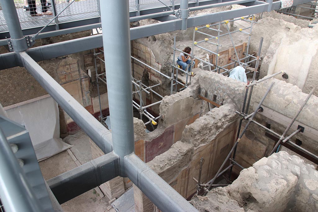 IX.12.B Pompeii. October 2024. 
Looking north-east from above room 8, with corridor 9 leading into room 15, and room 10, centre left. 
Photo courtesy of Klaus Heese.