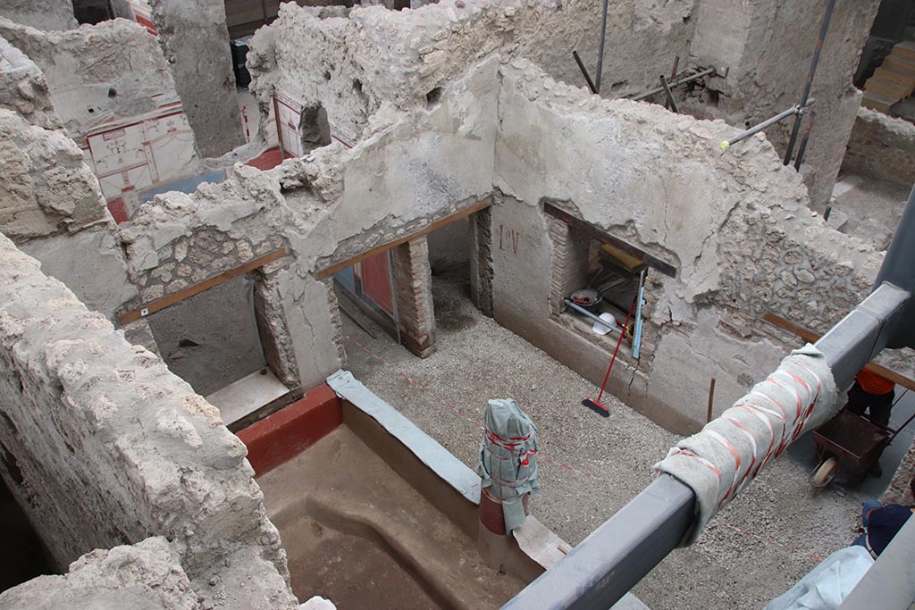 IX.12.B Pompeii. October 2024. 
Room 15, looking south-west towards doorway to room 16, in centre, and window into room 8, centre right. Photo courtesy of Klaus Heese.