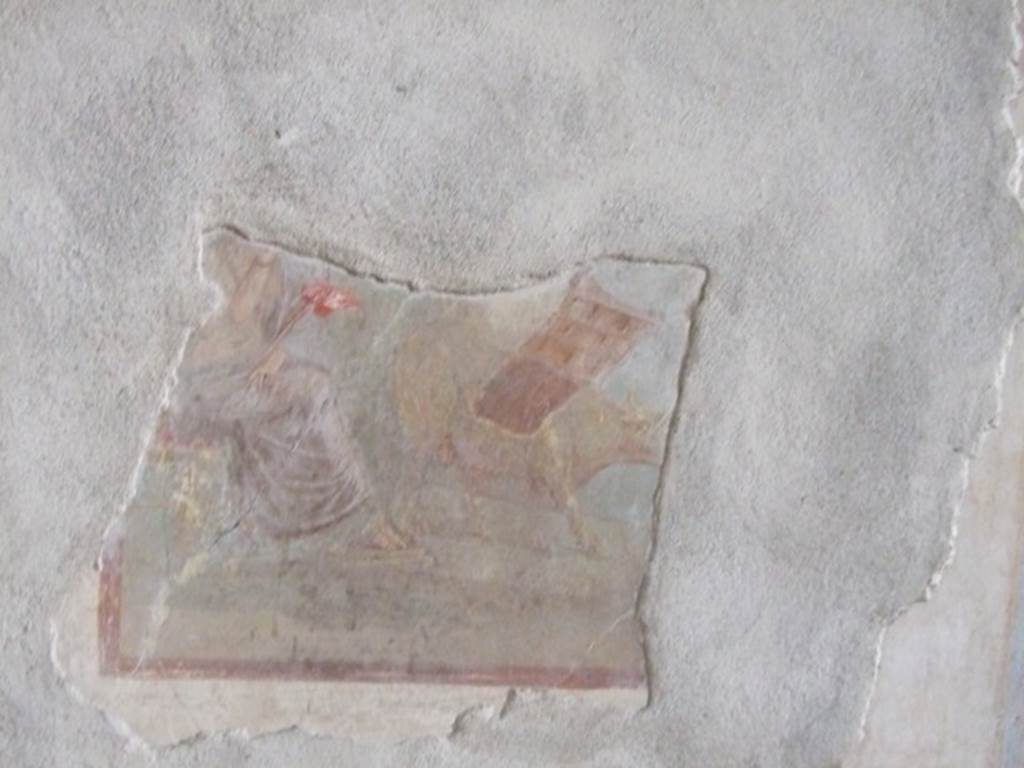 IX.13.1-3 Pompeii. March 2009. Room 17, remains of mythological painting on east wall.