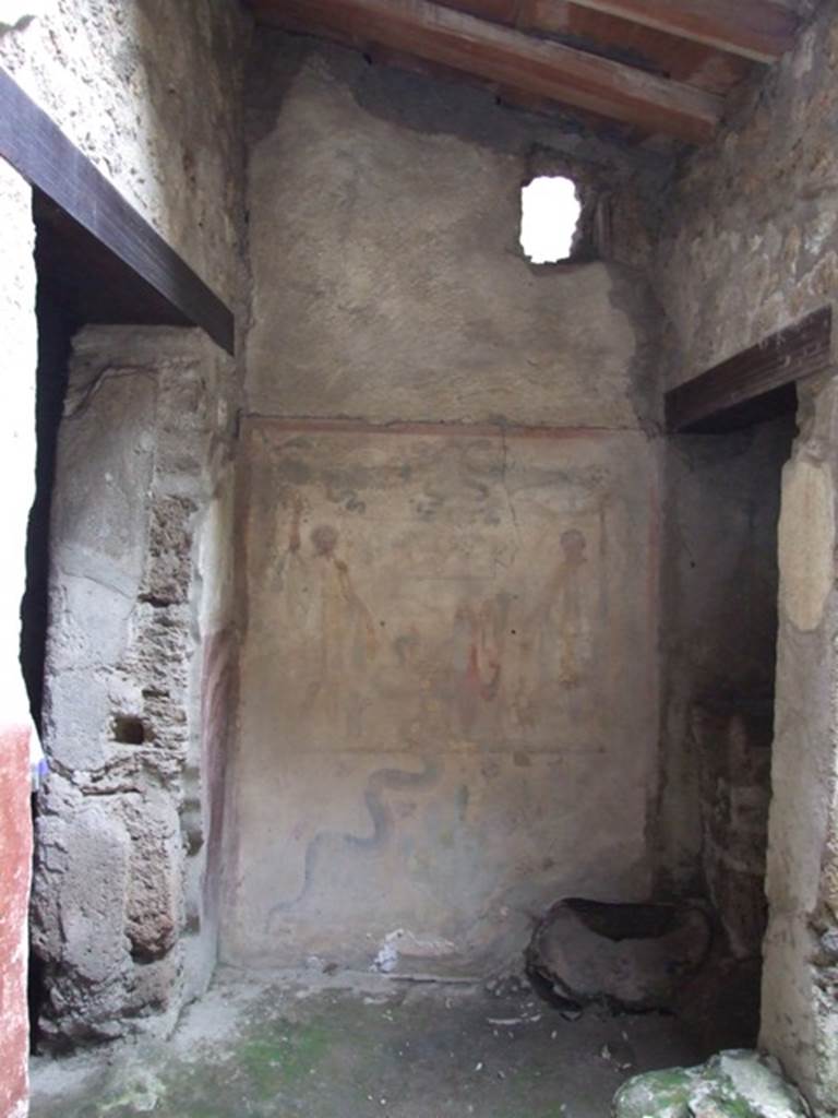 IX.13.1-3 Pompeii. March 2009. Room 21, lararium in south west corner, west wall of services atrium.