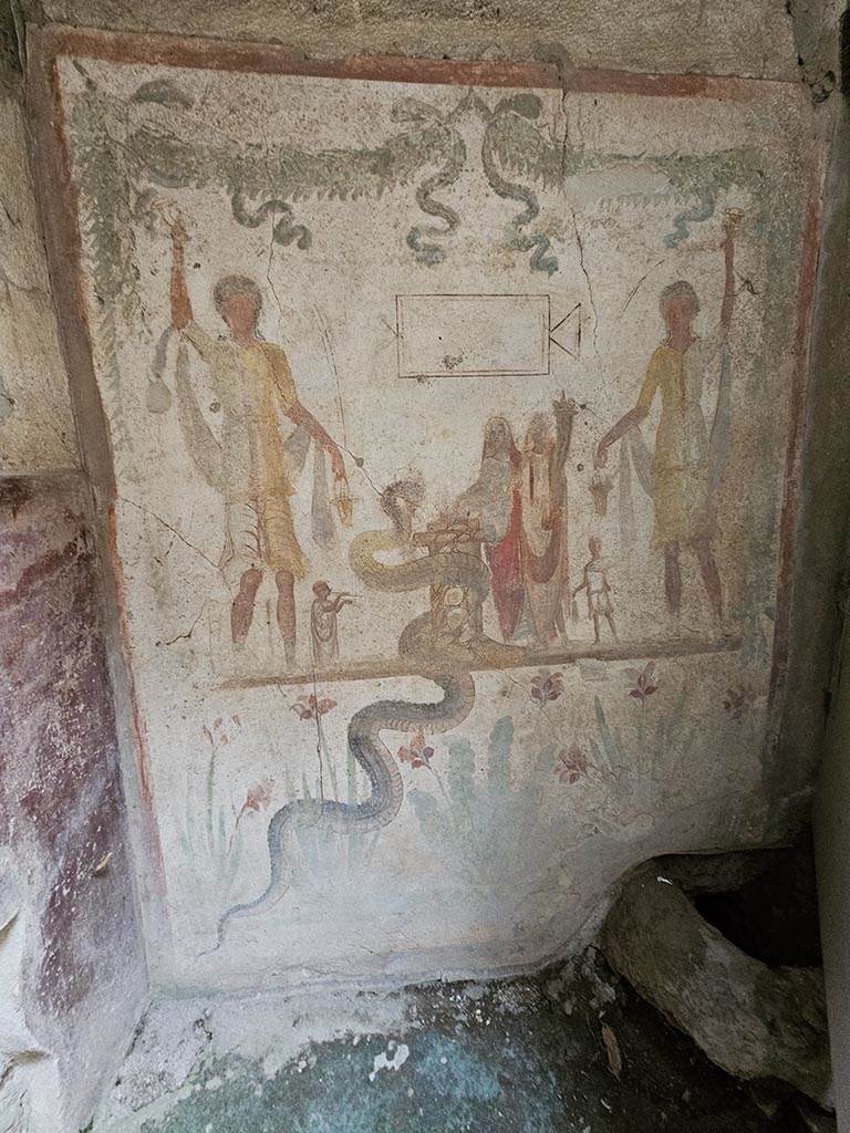 IX.13.1-3 Pompeii. November 2024.
Room 21, lararium in south-west corner, west wall of services atrium. Photo courtesy of Annette Haug.