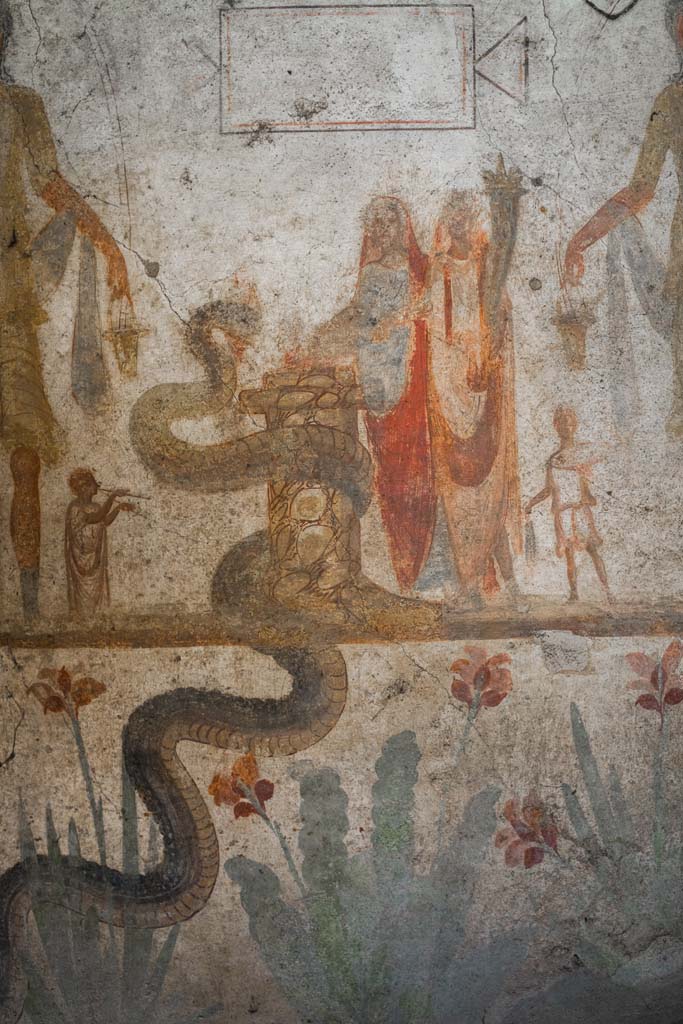 IX.13.1-3 Pompeii. October 2021. 
Room 21, detail from lararium. Photo courtesy of Johannes Eber.