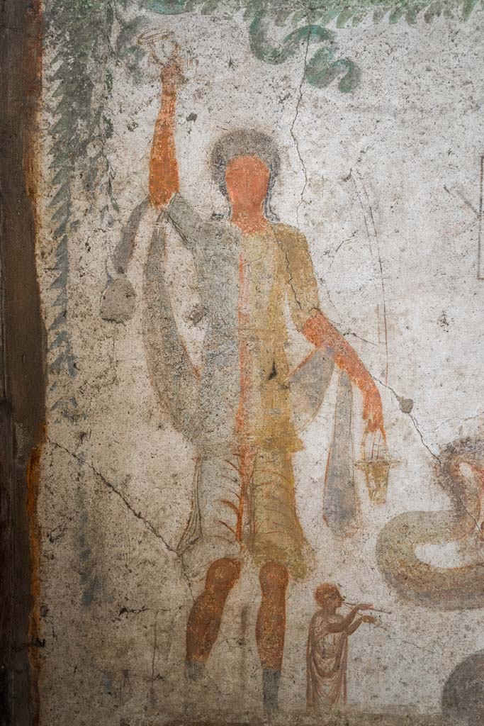 IX.13.1-3 Pompeii. October 2021. 
Room 21, detail from lararium. Photo courtesy of Johannes Eber.