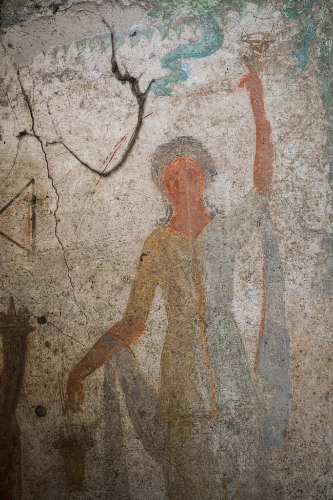 IX.13.1-3 Pompeii. October 2021. 
Room 21, detail from lararium. Photo courtesy of Johannes Eber.