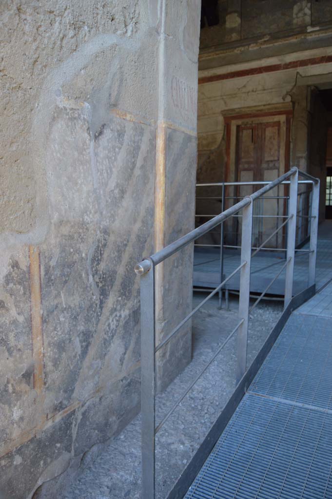 IX.13.1-3 Pompeii. March 2019. Looking north from entrance doorway, detail of west wall. 
Foto Taylor Lauritsen, ERC Grant 681269 DÉCOR.
