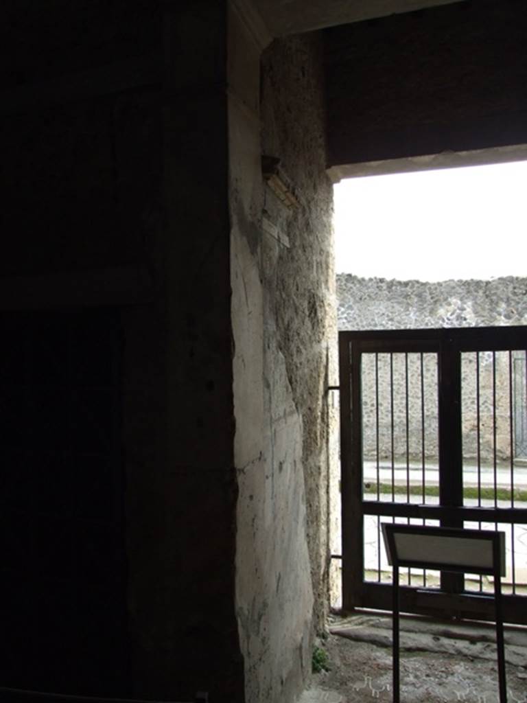 IX.13.1-3 Pompeii. March 2009. Room 1, south wall, east side of doorway of  IX.13.3.