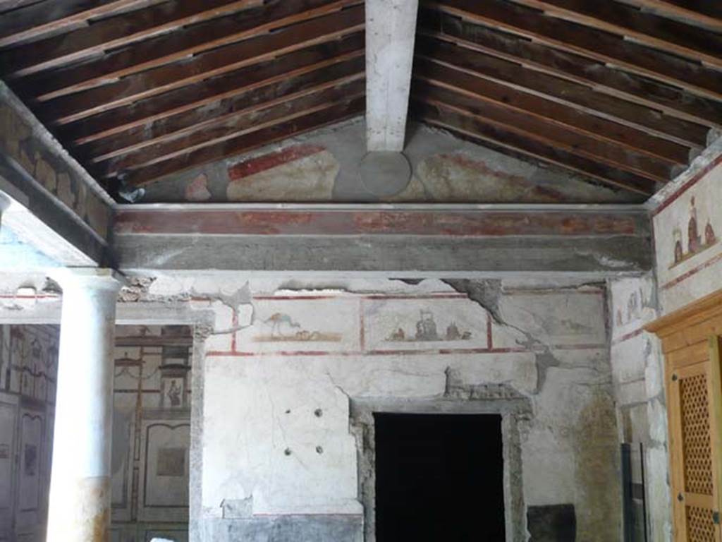 IX.13.1-3 Pompeii. May 2012. 
Room 9, looking towards north wall of portico. Room 10 doorway is right of centre. Photo courtesy of Buzz Ferebee.