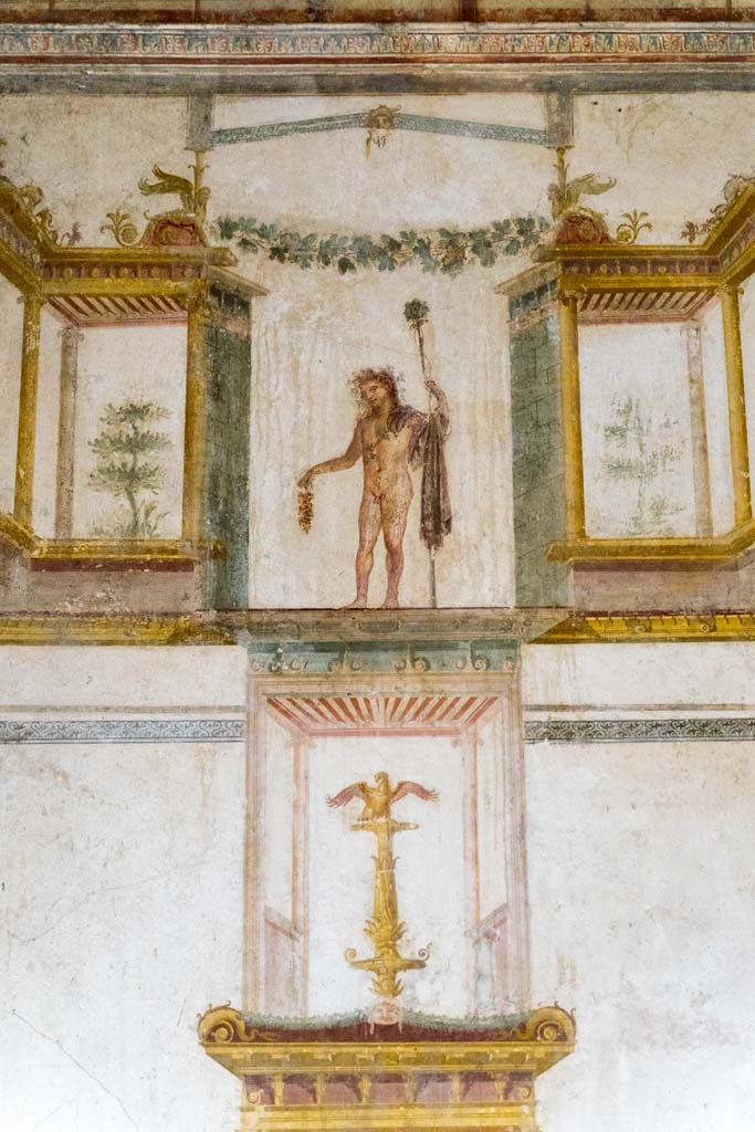 IX.13.1-3 Pompeii. October 2021. 
Room 11, detail from west wall at south end. Photo courtesy of Johannes Eber.