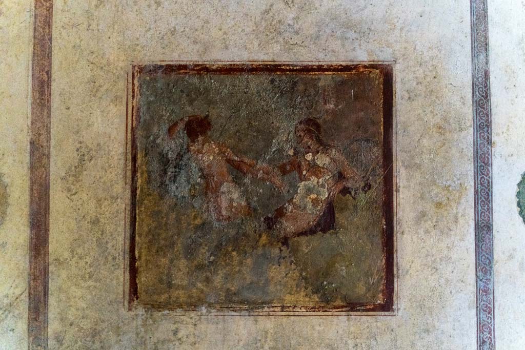 IX.13.1-3 Pompeii. October 2021. 
Room 11, wall painting of Apollo and Daphne from centre of east wall. Photo courtesy of Johannes Eber.