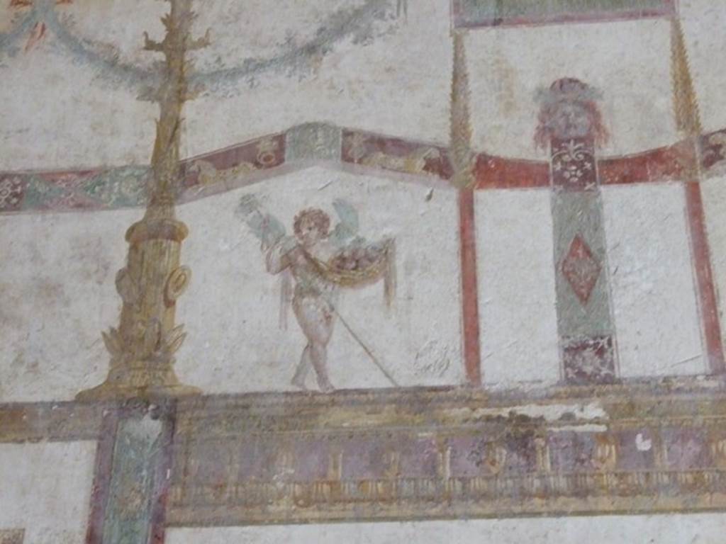 IX.13.1-3 Pompeii. March 2009. Room 11, detail of figure from upper north end of east wall.