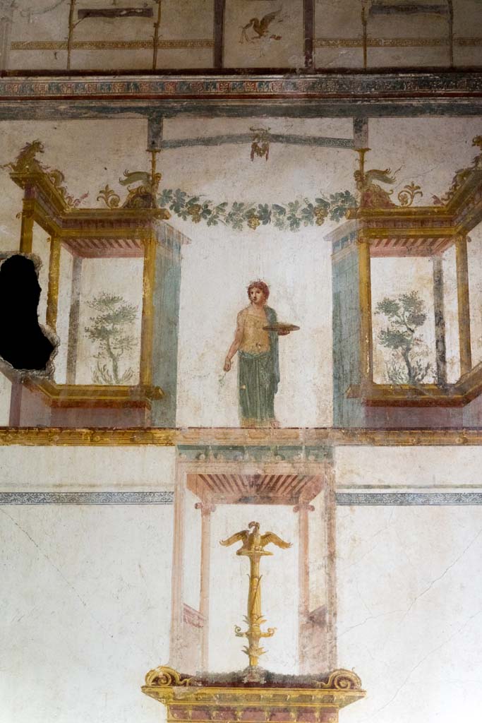 IX.13.1-3 Pompeii. October 2021. 
Room 11, detail from south end of east wall. Photo courtesy of Johannes Eber.