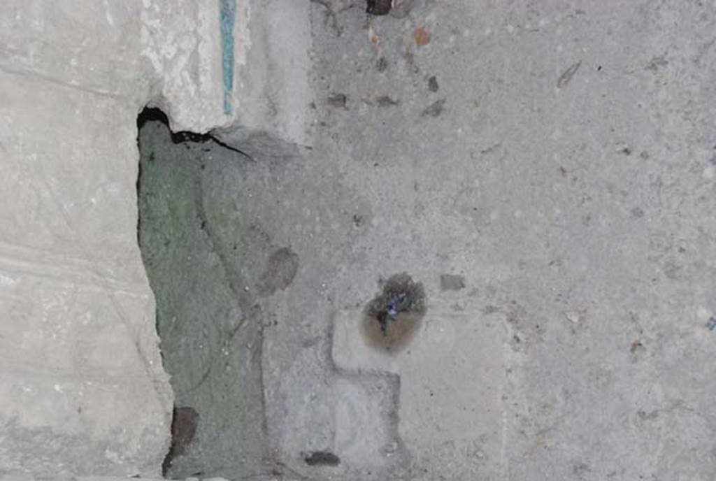 IX.13.1-3 Pompeii. October 2007. Antechamber of Room 12, detail of floor below doorway.  Photo courtesy of Nicolas Monteix.