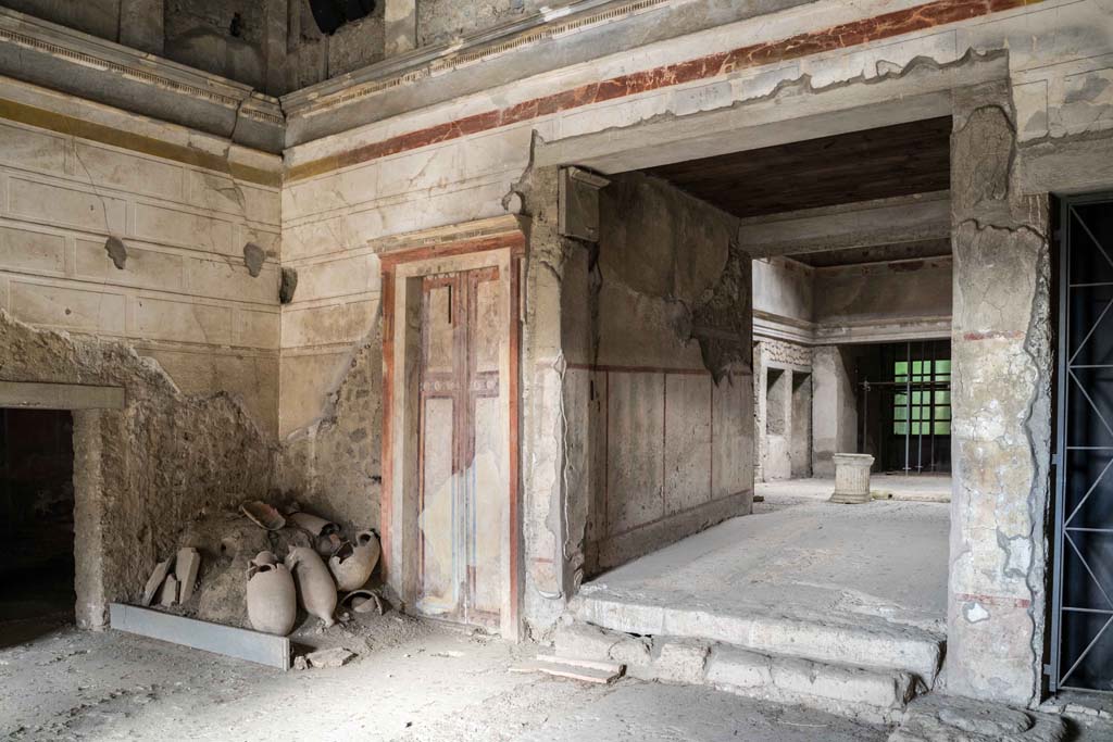 IX.13.3 Pompeii. October 2021. 
Room 1, looking towards north-west corner, on left, and room 28 leading to atrium, room 2, on right. Photo courtesy of Johannes Eber.