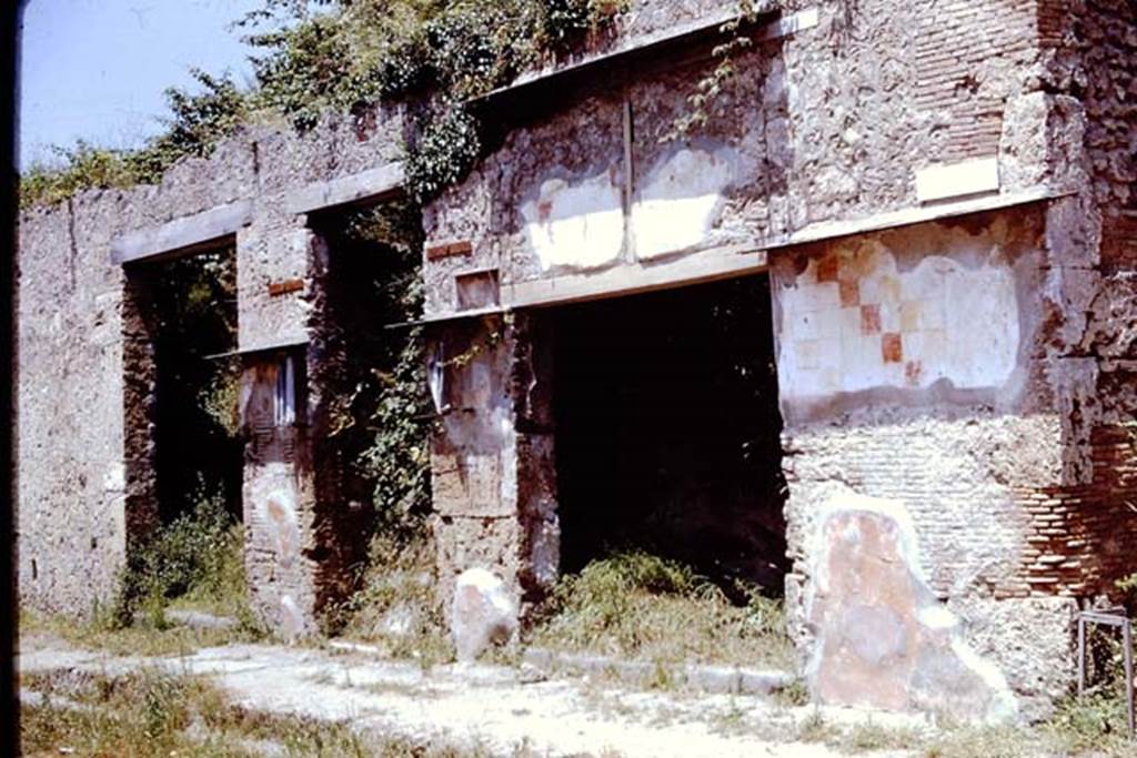 IX.13.6 Pompeii, on right. 1961. Looking towards doorways to IX.13.4, IX.13.5 and IX.13.6 on north side of Via dell’Abbondanza. Photo by Stanley A. Jashemski.
Source: The Wilhelmina and Stanley A. Jashemski archive in the University of Maryland Library, Special Collections (See collection page) and made available under the Creative Commons Attribution-Non Commercial License v.4. See Licence and use details.
J61f0707