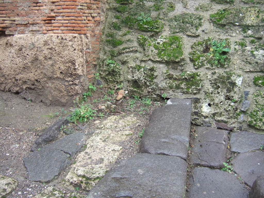 IX.13.6 Pompeii. December 2005. East corner of insula, adjoining unexcavated vicolo, looking north.