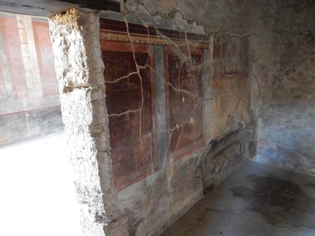 IX.14.4 Pompeii. May 2017. Room 5, looking towards south end of east wall, with recess. Photo courtesy of Buzz Ferebee.