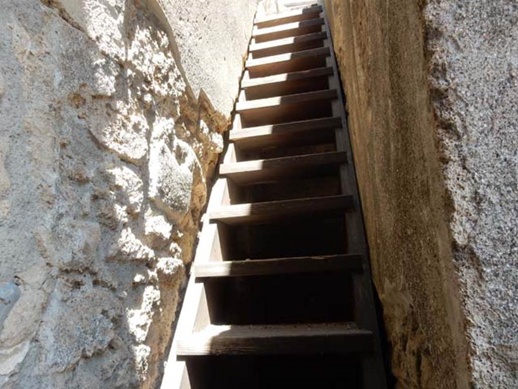 IX.14.4 Pompeii. May2017. Modern reconstruction of wooden stairs to upper floor, numbered 35.  Photo courtesy of Buzz Ferebee.