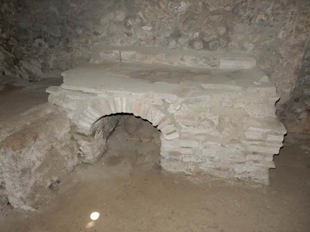 IX.14.4 Pompeii. May 2017. Room 18, hearth or large podium against north wall in kitchen. Photo courtesy of Buzz Ferebee.