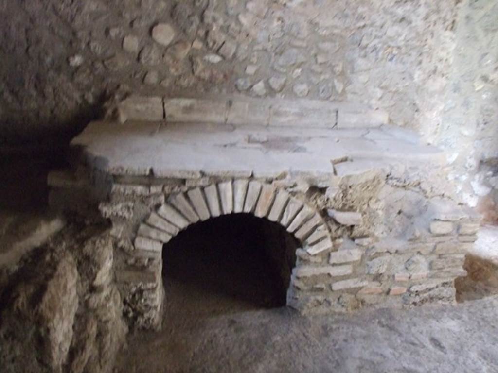 IX.14.4 Pompeii. December 2007. Room 18, looking north at hearth in kitchen.
