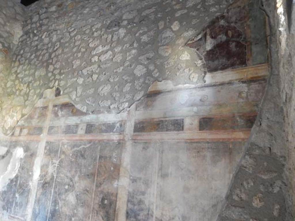 IX.14.4 Pompeii. May 2017. Room 14, east end of north wall, now with only a piece of the bird fresco, see below.  Photo courtesy of Buzz Ferebee.