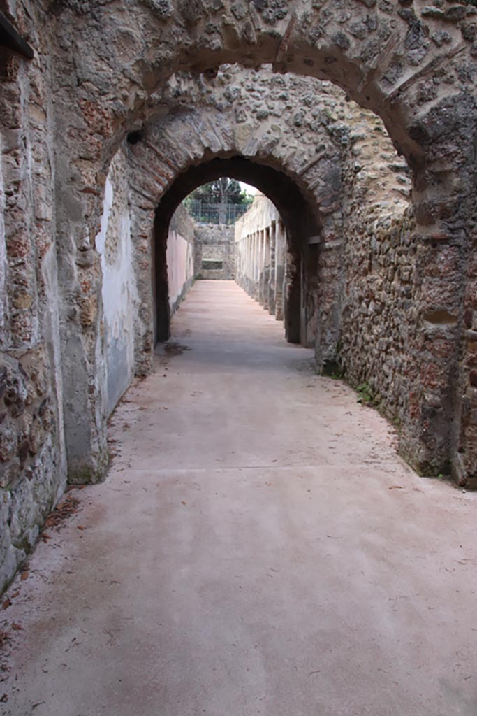 Villa of Diomedes, Pompeii. October 2023. 
Looking west along room 5,a from east end, across 5,b and into the south portico. 
Photo courtesy of Klaus Heese.